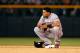 DENVER, CO - AUGUST 03: Melky Cabrera #53 of the San Francisco Giants pauses at second base after doubling against the Colorado Rockies at Coors Field on August 3, 2012 in Denver, Colorado. The Giants defeated the Rockies 16-4. (Photo by Doug Pensinger/Getty Images)