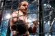 Triple H lurking inside the Elimination Chamber (Image Obtained From WWE.com)