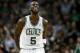 Feb 13, 2013; Boston, Massachusetts, USA; Boston Celtics forward/center Kevin Garnett (5) reacts during the fourth quarter against the Chicago Bulls at TD Banknorth Garden. The Boston Celtics won 71-69. Mandatory Credit: Greg M. Cooper-USA TODAY Sports