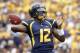 PITTSBURGH, PA - SEPTEMBER 01: Geno Smith #12 of the West Virginia Mountaineers drops back to pass against the Marshall Thundering Herd during the game on September 1, 2012 at Mountaineer Field in Morgantown, West Virginia. (Photo by Justin K. Aller/Getty Images)