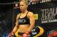 August 18, 2012; San Diego, CA, USA; Ronda Rousey (black shorts) in the cage to start her fight against Sarah Kaufman (not pictured) during their Strikeforce MMA women's bantamweight title bout at the Valley View Casino Center. Rousey won in 54 seconds of the first round. Mandatory Credit: Jayne Kamin-Oncea-USA TODAY Sports
