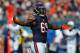 Sep 9, 2012; Chicago, IL, USA; Chicago Bears defensive end Henry Melton (69) celebrates a sack during the second half against the Indianapolis Colts at Soldier Field. The Bears won 41-21. Mandatory Credit: Dennis Wierzbicki-USA TODAY Sports