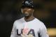 LOS ANGELES - MARCH 22: Jimmy Rollins #1 of the United States smiles as he walks off the field during the semifinal game of the 2009 World Baseball Classic against Japan on March 22, 2009 at Dodger Stadium in Los Angeles, California. (Photo by Stephen Dunn/Getty Images)