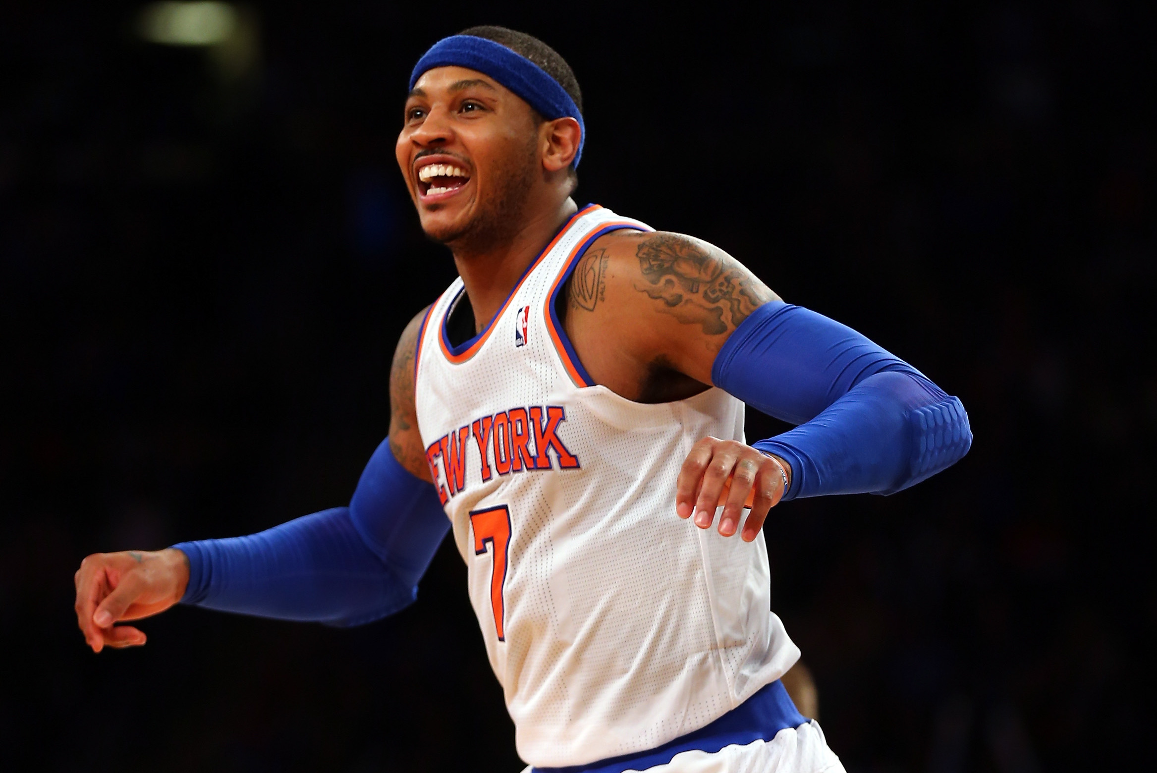 This is Carmelo Anthony and he is a 6'8 Small Forward. He plays