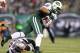EAST RUTHERFORD, NJ - NOVEMBER 22: Dustin Keller #81 of the New York Jets tries to get around Steve Gregory #28 of the New England Patriots on November 22, 2012 at MetLife Stadium in East Rutherford, New Jersey. (Photo by Elsa/Getty Images)
