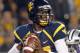 MORGANTOWN, WV - OCTOBER 20: Geno Smith #12 of the West Virginia Mountaineers drops back to pass against the Kansas State Wildcats during the game on October 20, 2012 at Mountaineer Field in Morgantown, West Virginia. (Photo by Justin K. Aller/Getty Images)