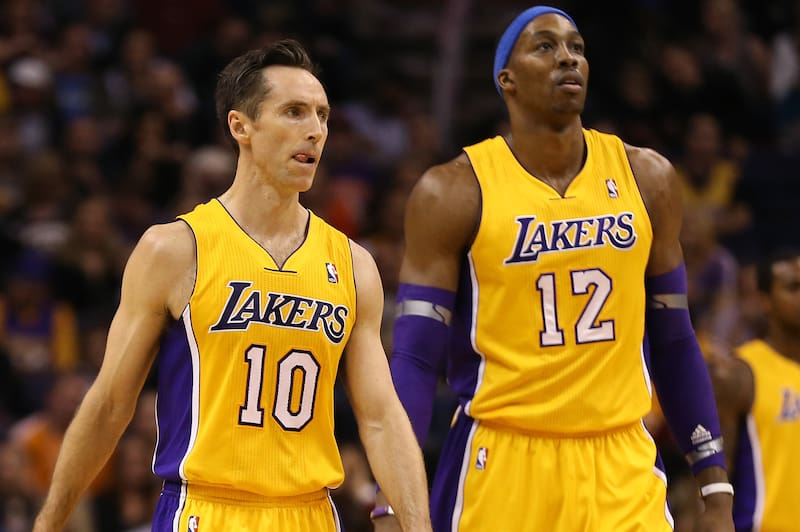 Jan. 30, 2013; Phoenix, AZ, USA: Los Angeles Lakers guard Steve Nash (10) and center Dwight Howard (12) against the Phoenix Suns at the US Airways Center. Mandatory Credit: Mark J. Rebilas-USA TODAY Sports