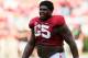 TUSCALOOSA, AL - SEPTEMBER 08: Chance Warmack #65 of the Alabama Crimson Tide walks to the sideline during an injury timeout against the Western Kentucky Hilltoppers at Bryant-Denny Stadium on September 8, 2012 in Tuscaloosa, Alabama. (Photo by Kevin C. Cox/Getty Images)