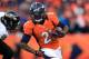 DENVER, CO - JANUARY 12: Ronnie Hillman #21 of the Denver Broncos runs with the ball against the Baltimore Ravens during the AFC Divisional Playoff Game at Sports Authority Field at Mile High on January 12, 2013 in Denver, Colorado. The Ravens won 38-35 in 2 overtimes. (Photo by Doug Pensinger/Getty Images)