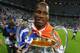 MUNICH, GERMANY - MAY 19: Didier Drogba of Chelsea celebrates with the trophy after their victory in the UEFA Champions League Final between FC Bayern Muenchen and Chelsea at the Fussball Arena München on May 19, 2012 in Munich, Germany. (Photo by Alex Livesey/Getty Images)