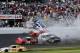 DAYTONA BEACH, FL - FEBRUARY 23: Kyle Larson, driver of the #32 Clorox Chevrolet, Justin Allgaier, driver of the #31 Brandt Chevrolet, Brian Scott, driver of the #2 Shore Lodge Chevrolet, Parker Kligerman, driver of the #77 Bandit Chippers Toyota, and Brad Keselowski, driver of the #22 Discount Tire Dodge, are involved in an incident at the finish of the NASCAR Nationwide Series DRIVE4COPD 300 at Daytona International Speedway on February 23, 2013 in Daytona Beach, Florida. (Photo by Jerry Markland/Getty Images)