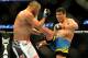 Feb 23, 2013; Anaheim, CA, USA; Dan Henderson (blue gloves) fights Lyoto Machida (red gloves) during their UFC welterweight bout at the Honda Center. Mandatory Credit: Jayne Kamin-Oncea-USA TODAY Sports