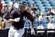 March 2, 2012; Tampa, FL, USA; New York Yankees right fielder Zoilo Almonte (83) hits a RBI double in the fourth inning during spring training against the South Florida Bulls at George M. Steinbrenner Field. Mandatory Credit: Kim Klement-USA TODAY Sports