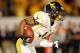 MIAMI GARDENS, FL - JANUARY 04: Tavon Austin #1 of the West Virginia Mountaineers runs with the ball against the Clemson Tigers during the Discover Orange Bowl at Sun Life Stadium on January 4, 2012 in Miami Gardens, Florida. (Photo by Mike Ehrmann/Getty Images)