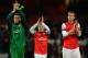 LONDON, ENGLAND - NOVEMBER 21: Wojciech Szczesny, Jack Wilshere and Thomas Vermaelen of Arsenal applaud the fans after the UEFA Champions League group B match between Arsenal FC and Montpellier Herault SC at Emirates Stadium on November 21, 2012 in London, England. (Photo by Mike Hewitt/Getty Images)