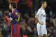 BARCELONA, SPAIN - NOVEMBER 29: Cristiano Ronaldo of Real Madrid (R) and Lionel Messi of FC Barcelona look on during the La Liga match between Barcelona and Real Madrid at the Camp Nou Stadium on November 29, 2010 in Barcelona, Spain. Barcelona won the match 5-0. (Photo by David Ramos/Getty Images)