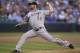 SEATTLE, WA - AUGUST 27: John Danks #50 of the Chicago White Sox delivers a pitch during a game against the Seattle Mariners at Safeco Field on August 27, 2011 in Seattle, Washington. (Photo by Stephen Brashear/Getty Images)