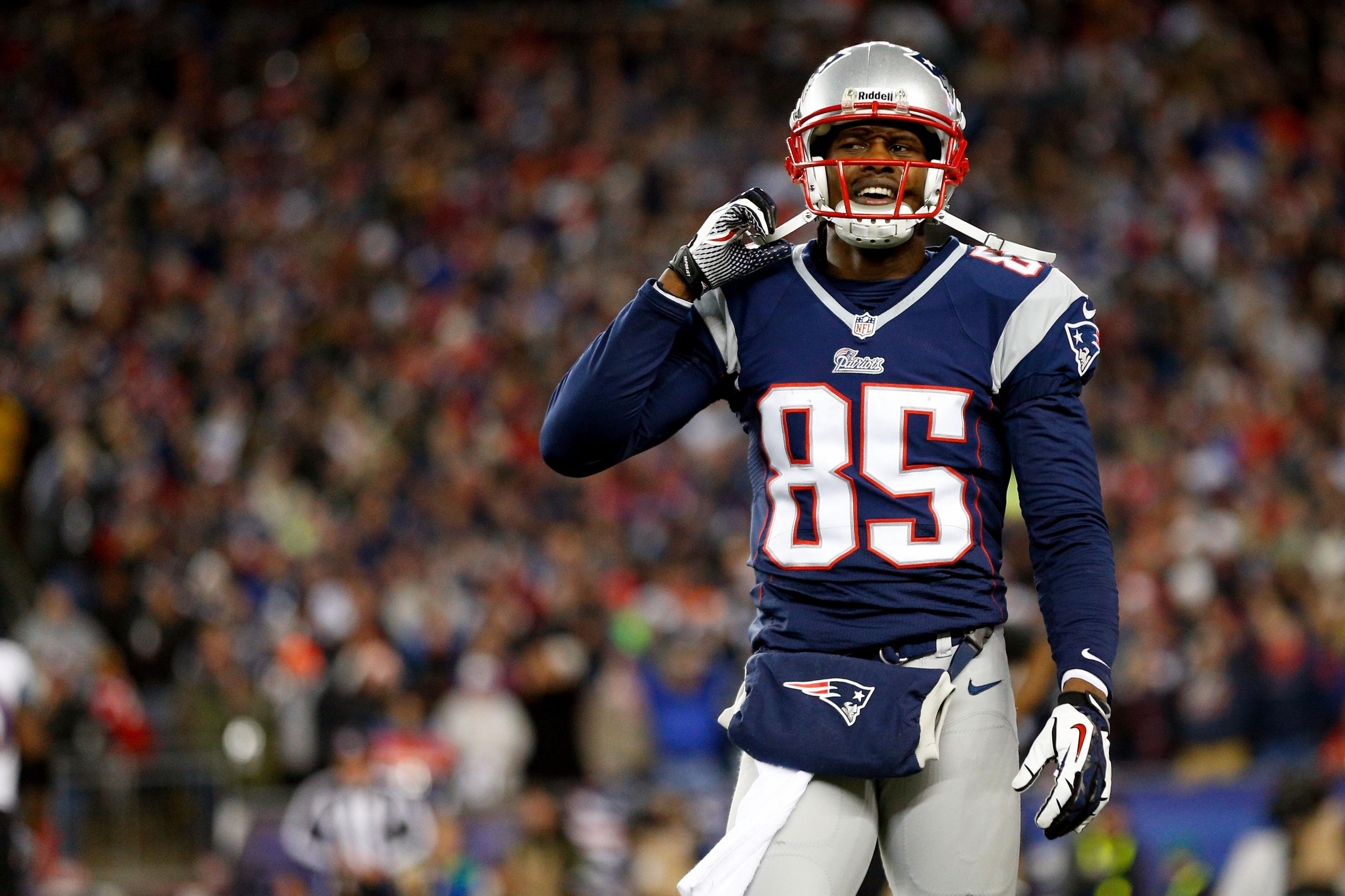 Brandon Lloyd of the New England Patriots recovers a fumble by  New  england patriots football, Patriots football, New england patriots