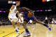 OAKLAND, CA - NOVEMBER 19: Amar'e Stoudemire #1 of the New York Knicks dribbles past Andris Biedrins #15 of the Golden State Warriors at Oracle Arena on November 19, 2010 in Oakland, California. NOTE TO USER: User expressly acknowledges and agrees that, by downloading and or using this photograph, User is consenting to the terms and conditions of the Getty Images License Agreement. (Photo by Ezra Shaw/Getty Images)