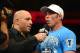 August 11, 2012; Denver, CO, USA; Joe Rogan (left) interviews Jake Shields (right) after he defeated Ed Herman (not pictured) during UFC 150 at the Pepsi Center. Mandatory Credit: Ron Chenoy-USA TODAY Sports