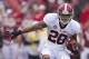 FAYETTEVILLE, AR - SEPTEMBER 15: Dee Milliner #28 of the Alabama Crimson Tide runs the ball against the Arkansas Razorbacks at Razorback Stadium on September 15, 2012 in Fayetteville, Arkansas. The Crimson Tide defeated the Razorbacks 52-0. (Photo by Wesley Hitt/Getty Images)