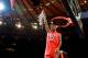 NEW YORK, NY - MARCH 10: Peyton Siva #3 of the Louisville Cardinals holds up the net after cutting it down after defeating the Cincinnati Bearcats during the finals of the Big East Men's Basketball Tournament at Madison Square Garden at Madison Square Garden on March 10, 2012 in New York City. (Photo by Chris Trotman/Getty Images)