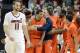 Jan 19, 2013; Louisville, KY, USA; Syracuse Orange guard Michael Carter-Williams (1) celebrates with his teammates after time expired in the second half against the Louisville Cardinals at the KFC Yum! Center. Syracuse defeated Louisville 70-68. Mandatory Credit: Jamie Rhodes-USA TODAY Sports