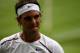 LONDON, ENGLAND - JUNE 26: Rafael Nadal of Spain reacts to a play during his Gentlemen's Singles first round match against Thomaz Bellucci of Brazil on day two of the Wimbledon Lawn Tennis Championships at the All England Lawn Tennis and Croquet Club on June 26, 2012 in London, England. (Photo by Clive Brunskill/Getty Images)