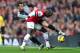 LONDON, ENGLAND - NOVEMBER 17: Gareth Bale of Tottenham Hotspur (L) is challenged by Bacary Sagna of Arsenal during the Barclays Premier league match between Arsenal and Tottenham Hotspur at Emirates Stadium on November 17, 2012 in London, England. (Photo by Clive Rose/Getty Images,)