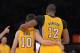 Feb 12, 2013; Los Angeles, CA, USA; Los Angeles Lakers guard Steve Nash (10) and center Dwight Howard (12) embrace in the fourth quarter against the Phoenix Suns at the Staples Center. The Lakers defeated the Suns 91-85. Mandatory Credit: Kirby Lee/USA TODAY Sports