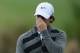 PALM BEACH GARDENS, FL - MARCH 01: World number one and defending champion, Rory McIlroy of Northern Ireland walks off the course on the 18th hole, his nineth during the second round of the Honda Classic on March 1, 2013 in Palm Beach Gardens, Florida. (Photo by Stuart Franklin/Getty Images)