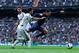 MADRID, SPAIN - MARCH 02: Adriano Correia of FC Barcelona is brought down by Alvaro Arbeloa and Sergio Ramos of Real Madrid CF during the La Liga match between Real Madrid CF and FC Barcelona at Bernabeu on March 2, 2013 in Madrid, Spain. (Photo by David Ramos/Getty Images)