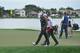 PALM BEACH GARDENS, FL - MARCH 01: World number one and defending champion, Rory McIlroy of Northern Ireland walks off the course on the 18th hole, his nineth during the second round of the Honda Classic on March 1, 2013 in Palm Beach Gardens, Florida. (Photo by Stuart Franklin/Getty Images)