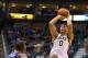 Mar 1, 2013; Salt Lake City, UT, USA; Utah Jazz center Enes Kanter (0) shoots over Charlotte Bobcats small forward Jeff Adrien (4) during the second half at EnergySolutions Arena. The Jazz won 98-68. Mandatory Credit: Russ Isabella-USA TODAY Sports