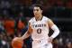 Feb 27, 2013; Coral Gables, FL, USA; Miami Hurricanes guard Shane Larkin (0) dribbles the ball against the Virginia Tech Hokies in the second half at the BankUnited Center. Miami won 76-58. Mandatory Credit: Robert Mayer-USA TODAY Sports