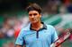 PARIS - MAY 28: Roger Federer of Switzerland looks on during his Men's Singles Second Round match against Jose Acasuso of Argentina on day five of the French Open at Roland Garros on May 28, 2009 in Paris, France. (Photo by Ryan Pierse/Getty Images)