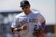 DENVER, CO - APRIL 29: Shortstop Troy Tulowitzki #2 of the Colorado Rockies heads to the dugout against the New York Mets at Coors Field on April 29, 2012 in Denver, Colorado. The Mets defeated the Rockies 6-5 in 11 innings. (Photo by Doug Pensinger/Getty Images)