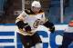 UNIONDALE, NY - SEPTEMBER 12: Craig Cunningham #61 of the Boston Bruins skates against the New York Islanders during a rookie game exhibition at Nassau Coliseum on September 12, 2011 in Uniondale, New York. The Bruins defeated the Islanders 8-5. (Photo by Bruce Bennett/Getty Images)