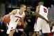 Mar 3, 2013; Madison, WI, USA; Wisconsin Badgers guard Ben Brust attempts to move the ball around Purdue Boilermakers guard Terone Johnson (0) and Badgers forward Ryan Evans (5) at the Kohl Center. Purdue defeated Wisconsin 69-56. Mandatory Credit: Mary Langenfeld-USA TODAY Sports