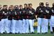 Mar 3, 2013; Jupiter, FL, USA; Miami Marlins players line up during the national anthem before a spring training game against the New York Mets at Roger Dean Stadium. Mandatory Credit: Steve Mitchell-USA TODAY Sports