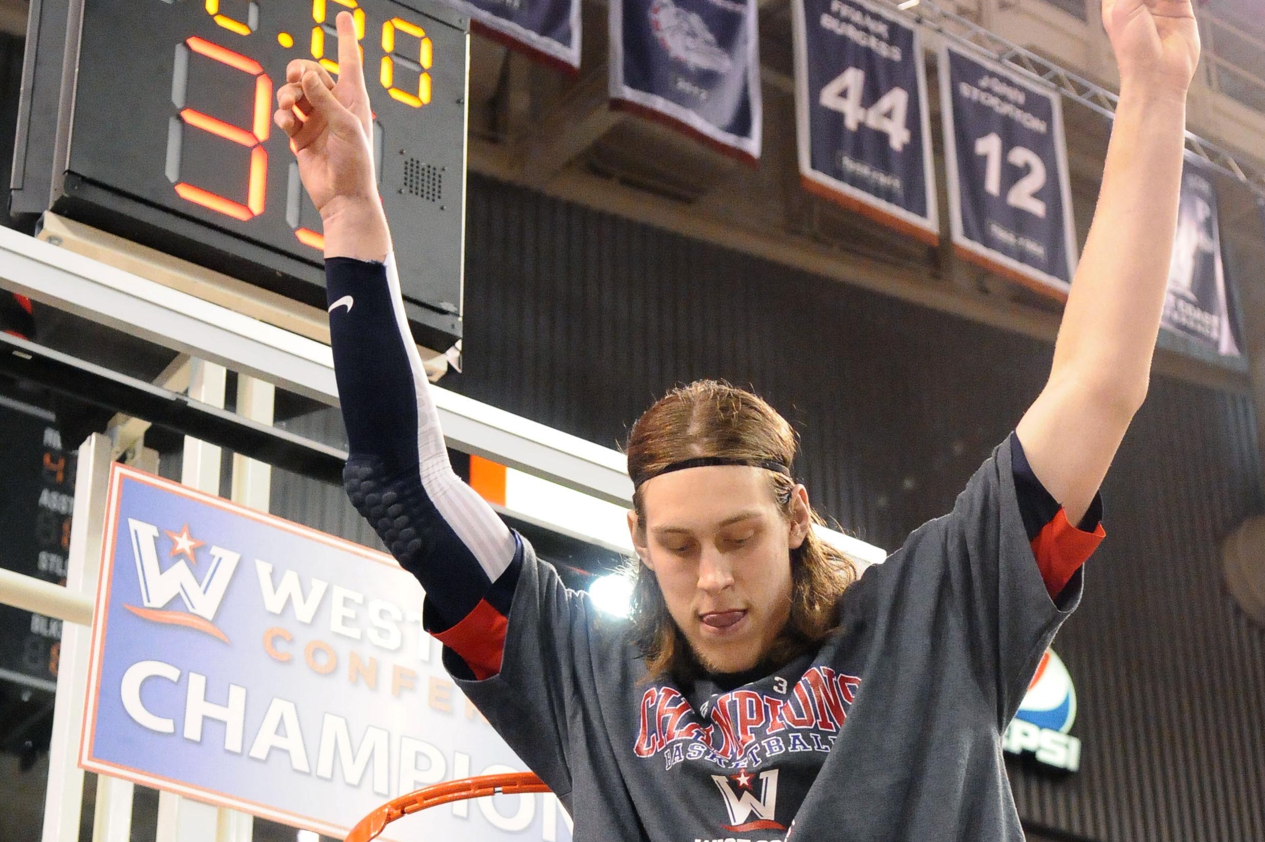Former Gonzaga big man Kelly Olynyk has changed his look in order to  benefit Wigs for Kids