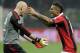 MILAN, ITALY - FEBRUARY 20: Kevin Prince Boateng and Cristian Abbiati (L) of AC Milan celebrate victory at the end of the UEFA Champions League Round of 16 first leg match between AC Milan and Barcelona at San Siro Stadium on February 20, 2013 in Milan, Italy. (Photo by Claudio Villa/Getty Images)