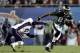 JACKSONVILLE, FL - FEBRUARY 6: Wide receiver Terrell Owens #81 of the Philadelphia Eagles runs with the ball past Randall Gay #21 of the New England Patriots during the fourth quarter of Super Bowl XXXIX at Alltel Stadium on February 6, 2005 in Jacksonville, Florida. (Photo by Brian Bahr/Getty Images)
