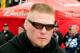 DAYTONA BEACH, FL - FEBRUARY 13: MMA fighter Brock Lesnar walks in the garage area during practice for the Daytona 500 at Daytona International Speedway on February 13, 2010 in Daytona Beach, Florida. (Photo by Sam Greenwood/Getty Images for NASCAR)
