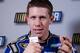 Carl Edwards makes a point to media during Daytona Media Day. Credit: Dwight Drum