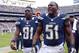 Dec 30, 2012; San Diego, CA, USA; San Diego Chargers inside linebacker Takeo Spikes (51) yells while escorted off the field by tight end Randy McMichael (81) after being ejected during the second quarter against the Oakland Raiders at Qualcomm Stadium. Mandatory Credit: Jake Roth-USA TODAY Sports