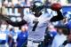 EAST RUTHERFORD, NJ - DECEMBER 30: Michael Vick #7 of the Philadelphia Eagles drops back to pass in the first half against the New York Giants at MetLife Stadium on December 30, 2012 in East Rutherford, New Jersey. (Photo by Elsa/Getty Images)