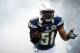 Dec 16, 2012; San Diego, CA, USA; San Diego Chargers inside linebacker Takeo Spikes (51) runs out of the smoke during pregame introduction before a game against the Carolina Panthers at Qualcomm Stadium. Mandatory Credit: Jake Roth-USA TODAY Sports