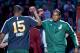 Feb 4, 2013; Salt Lake City, UT, USA; Utah Jazz power forward Paul Millsap (right) high-fives power forward Derrick Favors (15) during introductions prior to a game against the Sacramento Kings at EnergySolutions Arena. Mandatory Credit: Russ Isabella-USA TODAY Sports