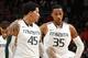 CORAL GABLES, FL - MARCH 6: Julian Gamble #45 and Kenny Kadji #35 of the Miami Hurricanes talk as they walk back onto the court after a time out before the final play of the game by the Georgia Tech Yellow Jackets on March 6, 2013 at the BankUnited Center in Coral Gables, Florida. Georgia Tech defeated Miami 71-69. (Photo by Joel Auerbach/Getty Images)